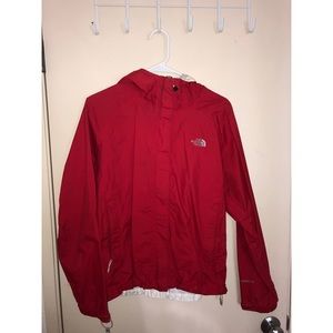 Red NorthFace windbreaker jacket